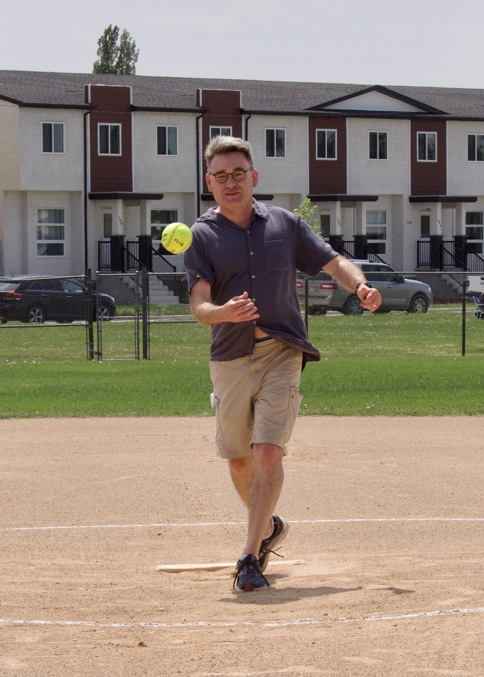Brian Mayes throws opening pitch